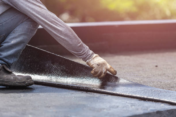 Professional Basement Waterproofing technician working in Angola, NY